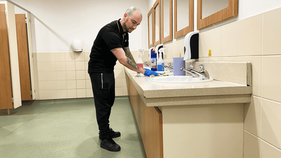 tiago  cleaning sink